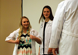 Northeast veterinary technology students receive coats and pins at ceremony